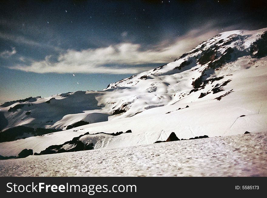 Mount Rainier as seen during a full moon night at 8,000 ft. Mount Rainier as seen during a full moon night at 8,000 ft