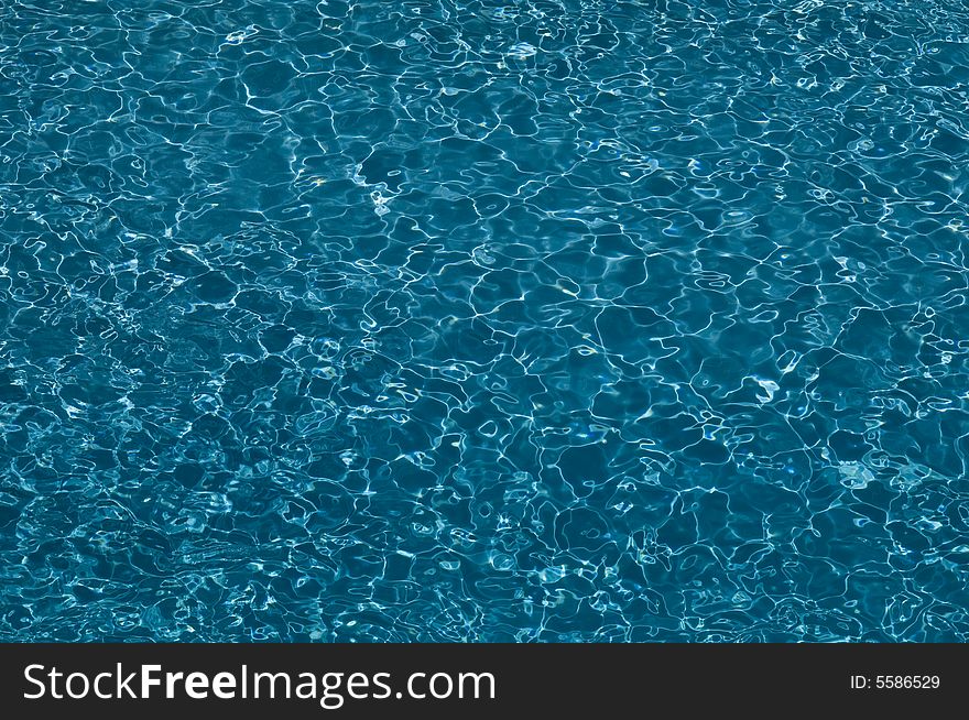 Blue wafes in swimming pool