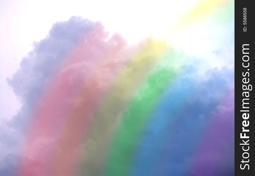 Rainbow on a background of the clouds