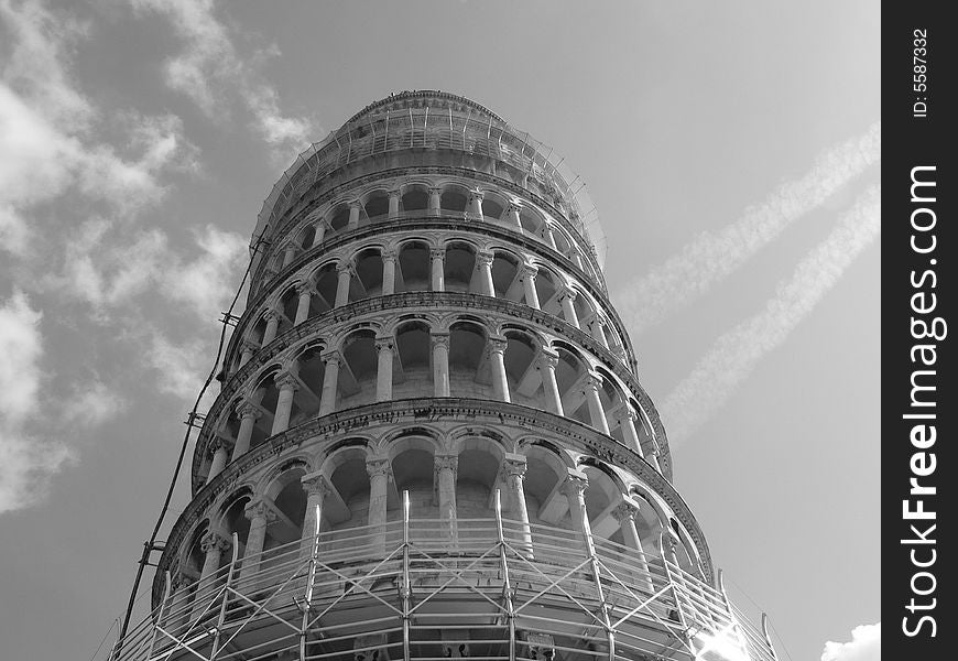 The Leaning Tower of Pisa -  The 14,500 ton, 8 story Bell Tower was begun in 1173.  Ten years later construction was halted (at 3 stories) because it was already visibly leaning.  From 1275-1284 a second architect slightly altered the angle and added to the building , only to stop after 7 stories because the lean worsened.  Finally in the mid 14th Century the belfry was added making the tower 180 feet high.