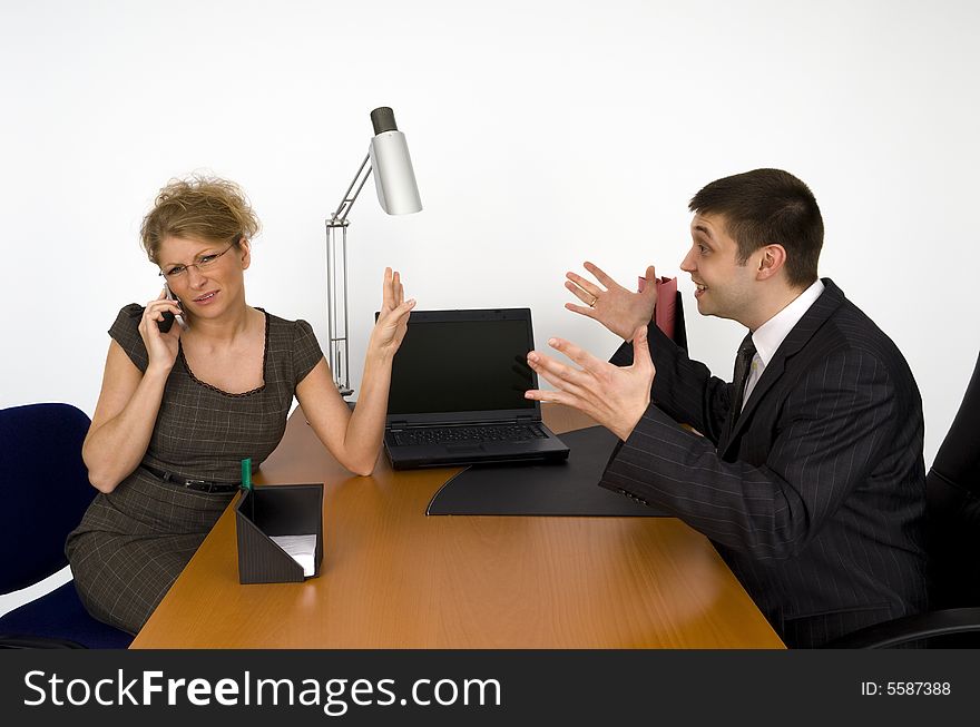 Business woman and businessman in office. Business woman and businessman in office.