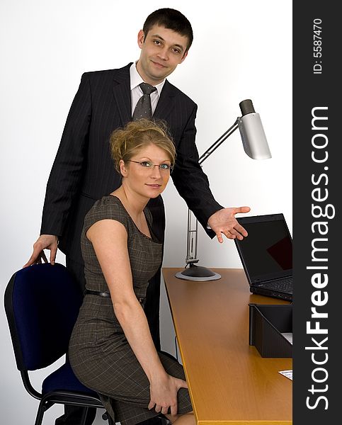 Businesswoman and businessman in office. Businesswoman and businessman in office.