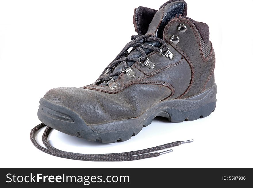 A leather boot isolated on white. Photographed in a studio.