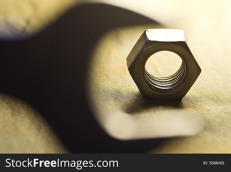 Close-up of a tool to screw a nut. Close-up of a tool to screw a nut