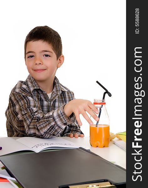 Happy smiling young boy doing studying and homework. Happy smiling young boy doing studying and homework