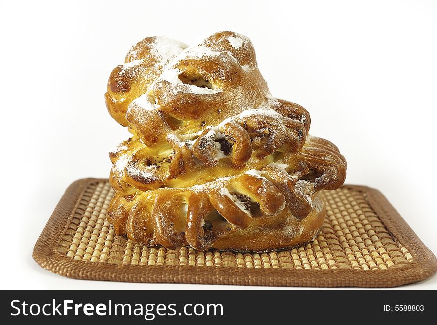 Sweet roll with raisin isolated on a white background. Sweet roll with raisin isolated on a white background