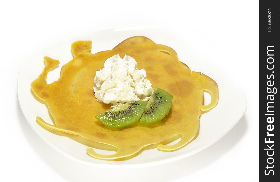 Pancakes filled with whipped cream cheese and kiwi. Pancakes filled with whipped cream cheese and kiwi