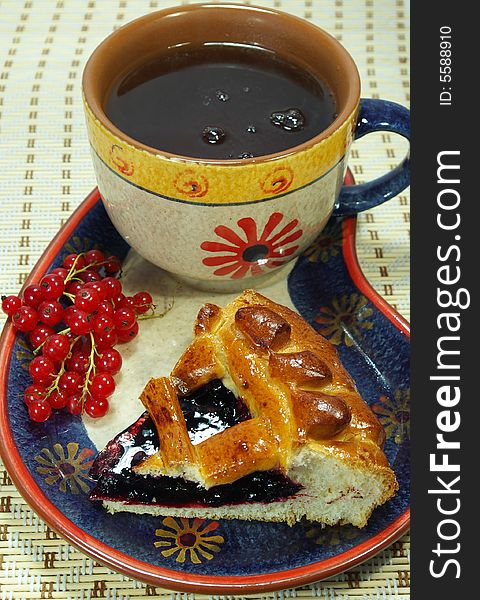 Fresh sweet pie with bilberry and cup of tea. Fresh sweet pie with bilberry and cup of tea