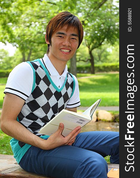 An Asian university student shoot at outdoor. An Asian university student shoot at outdoor