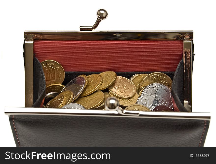 Purse and coins on a white