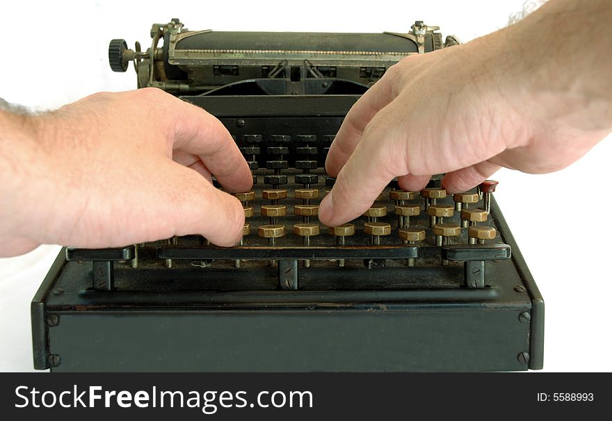 Hands typing on keyboard old typewriter, isolated on white