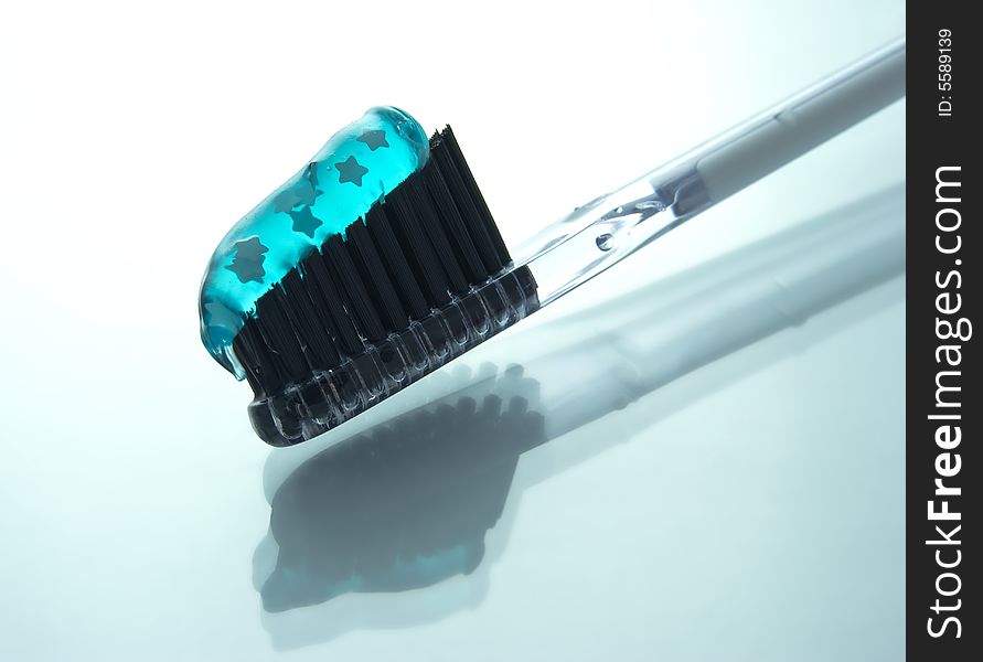 Closeup of tooth brush with blue tooth paste. Closeup of tooth brush with blue tooth paste