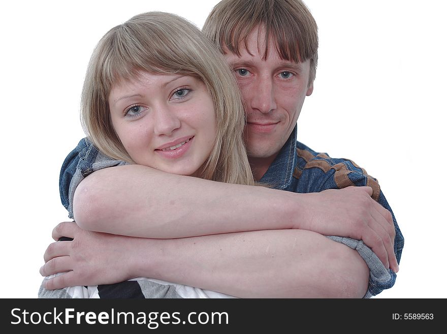 The man the big hands has embraced the smiling woman. The man the big hands has embraced the smiling woman