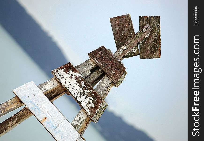 An old beach marker at a beach in Auckland