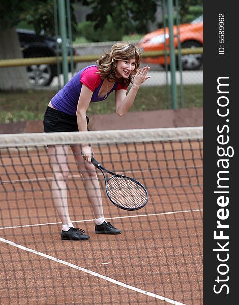 A tennis player in the game