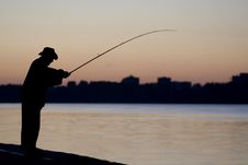 Fisherman Fishing In The Sun Set Royalty Free Stock Photo Fisherman Fishing In The Sun Set Royalty Free Stock Photo