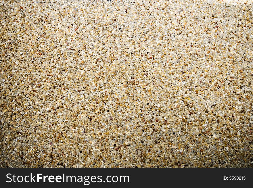 Close up of small pebbles in concrete. Close up of small pebbles in concrete.