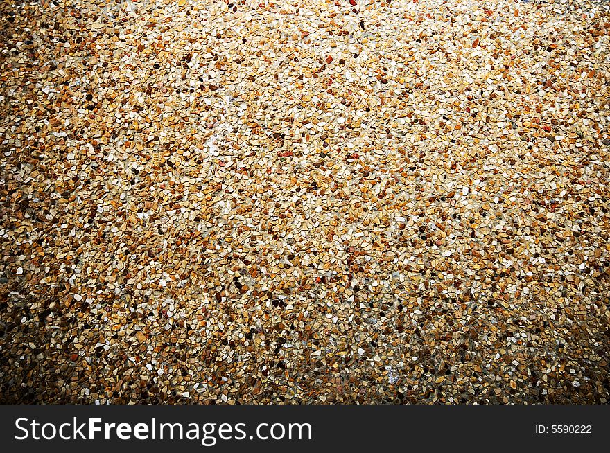 Close up of small pebbles in concrete. Close up of small pebbles in concrete.