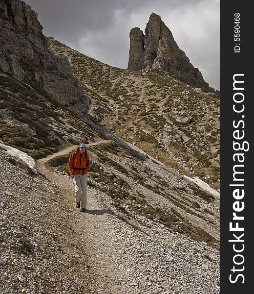 Woman trekking in Dolomites