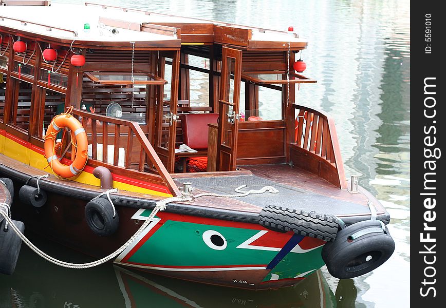A wooden boat for river tour.