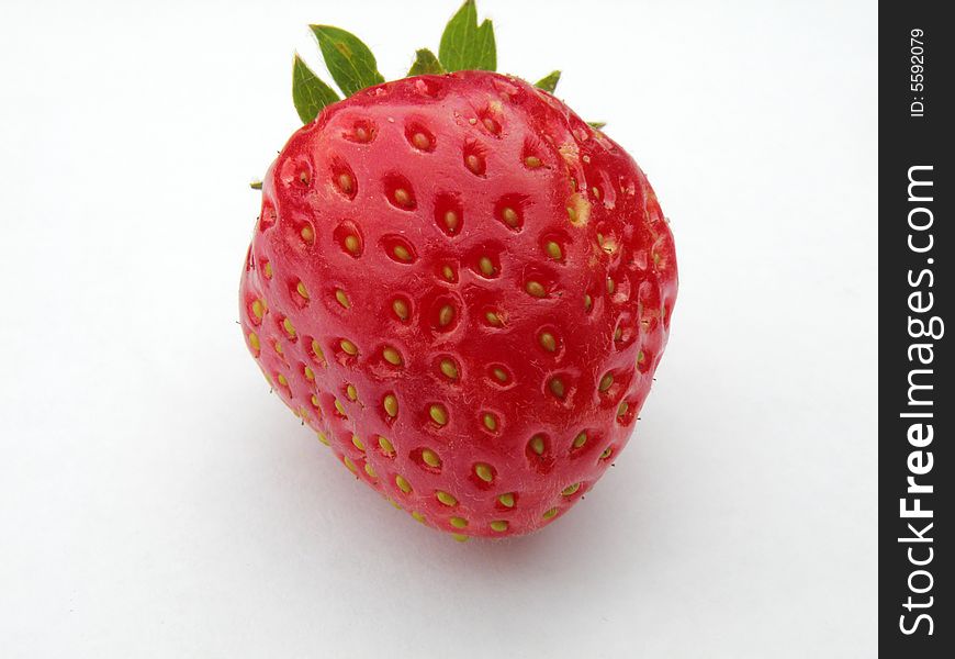Red strawberry on the paper