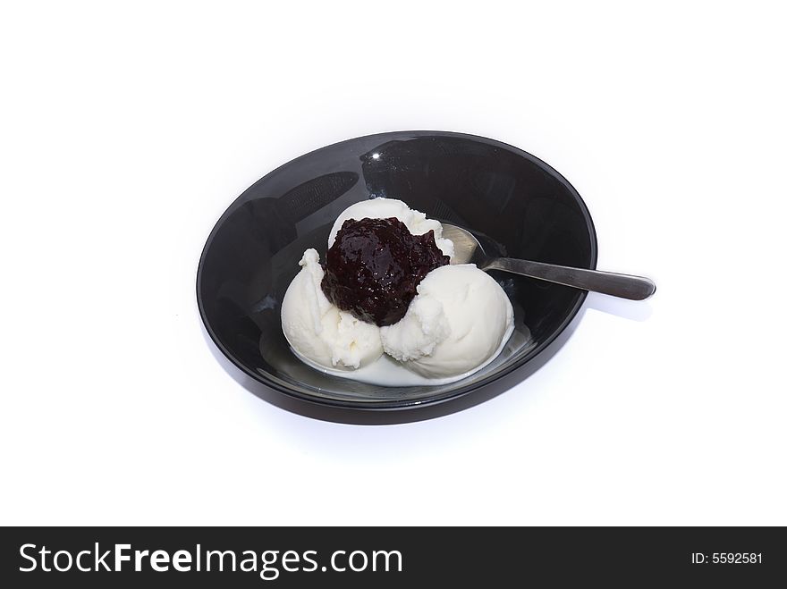 A very tasty ice cream and jam dessert