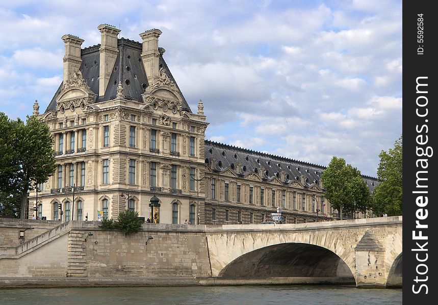 A nice view from bateaux Mouche of a big and beautiful building of Paris. A nice view from bateaux Mouche of a big and beautiful building of Paris.