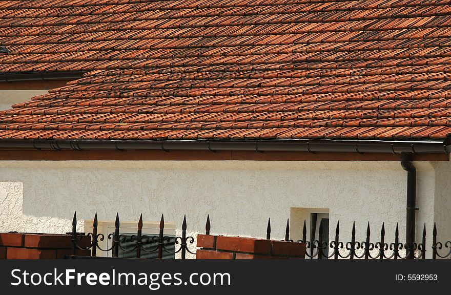 Roofs covered by a red tile