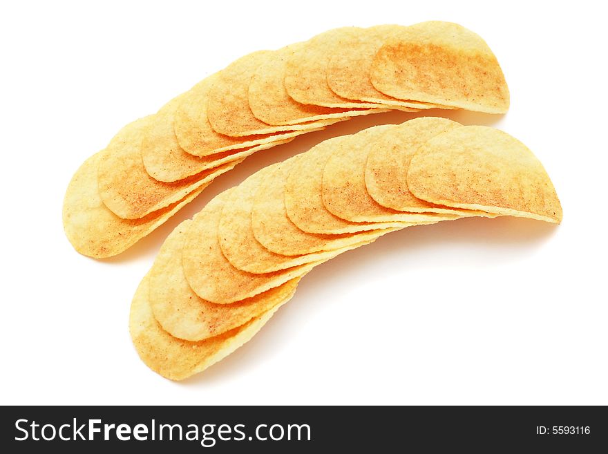 Two rows of potato chips stacked together on white background.