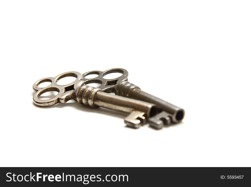 Isolated shot of two metal antique keys on white background. Isolated shot of two metal antique keys on white background