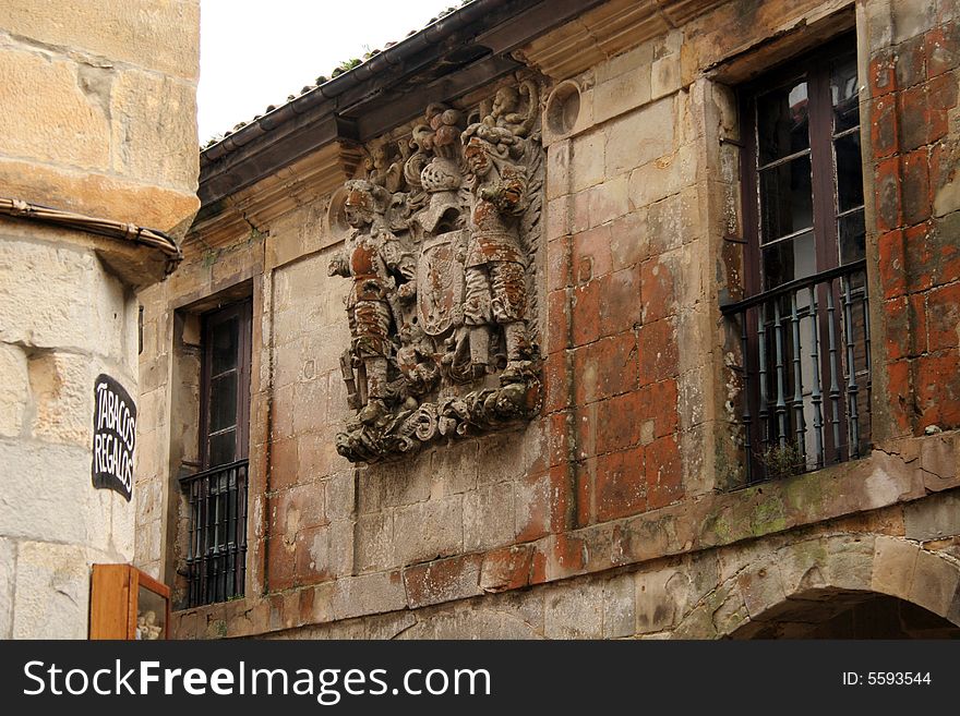 Court of Arms on old historic typical stone house in Santillana del Mar, Cantabria