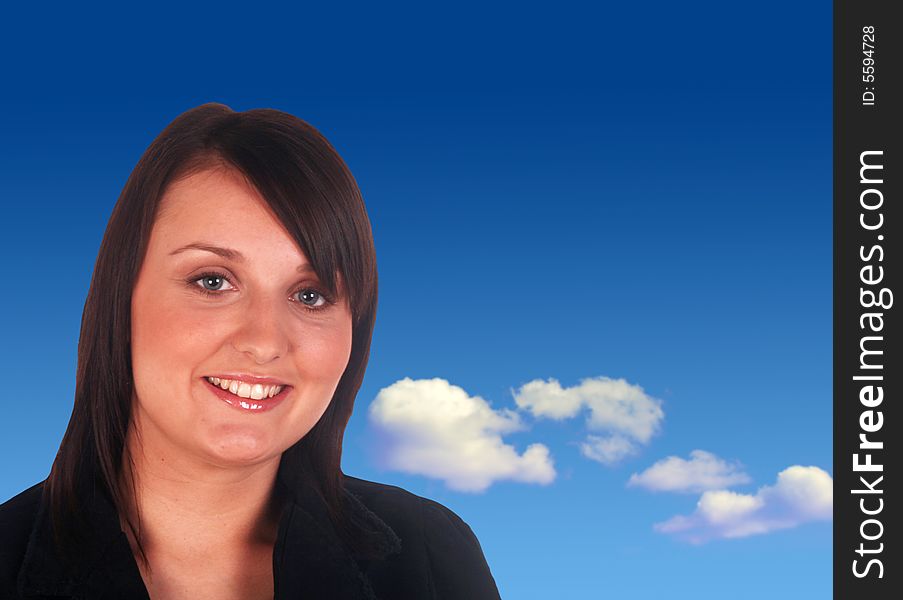 Happy, smiling business woman over blue cloudy sky. Happy, smiling business woman over blue cloudy sky