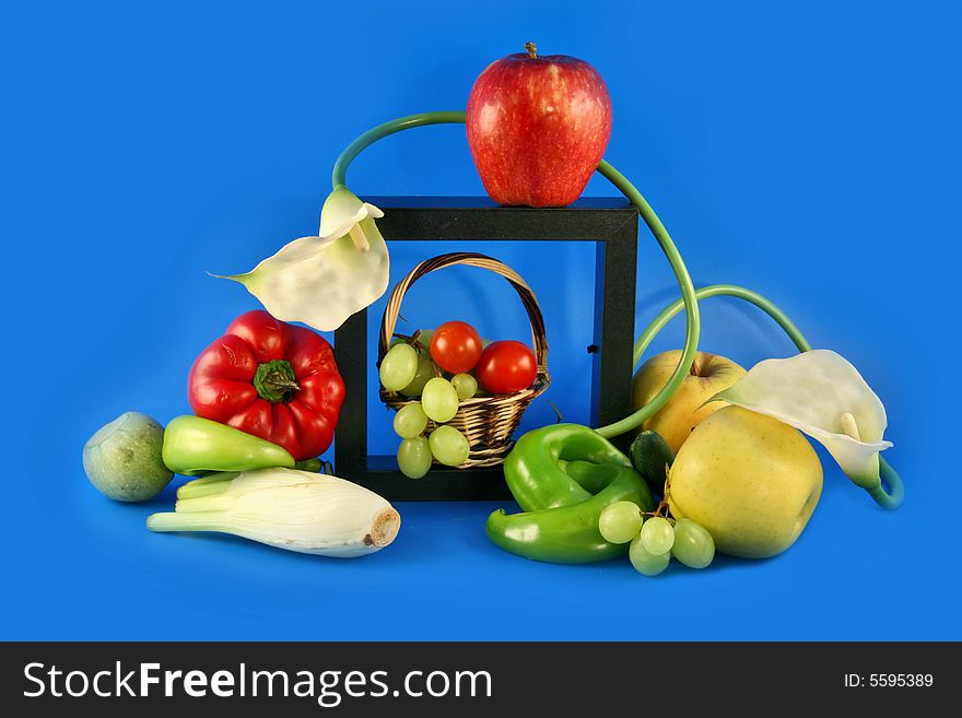 Beautiful still-life from vegetables, fruit and flowers. Beautiful still-life from vegetables, fruit and flowers.