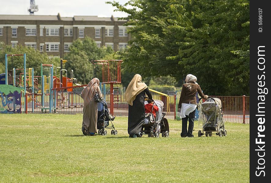 Three Women in Park with Prams. Three Women in Park with Prams.