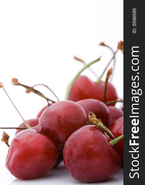 Heap of sweet crimson cherries, copy space for the text. Heap of sweet crimson cherries, copy space for the text