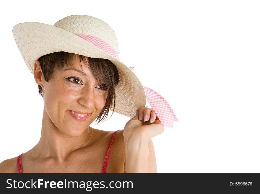 Young woman smiling wearing straw hat. Young woman smiling wearing straw hat