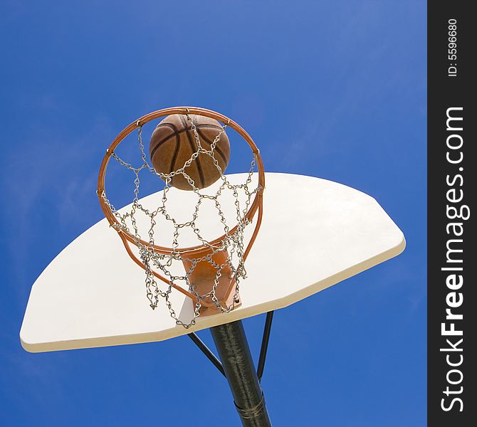 Basketball hoop in a green park. Basketball hoop in a green park