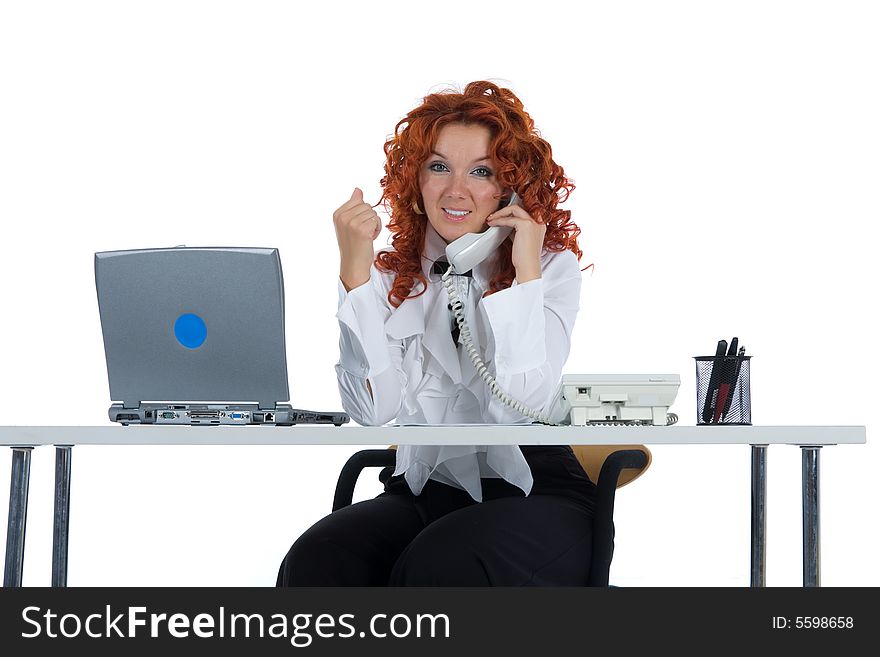 Beautiful young businesswoman calling in office