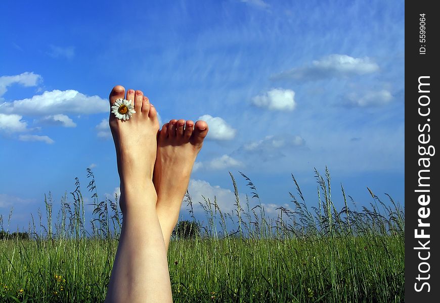 Woman resting on the grass