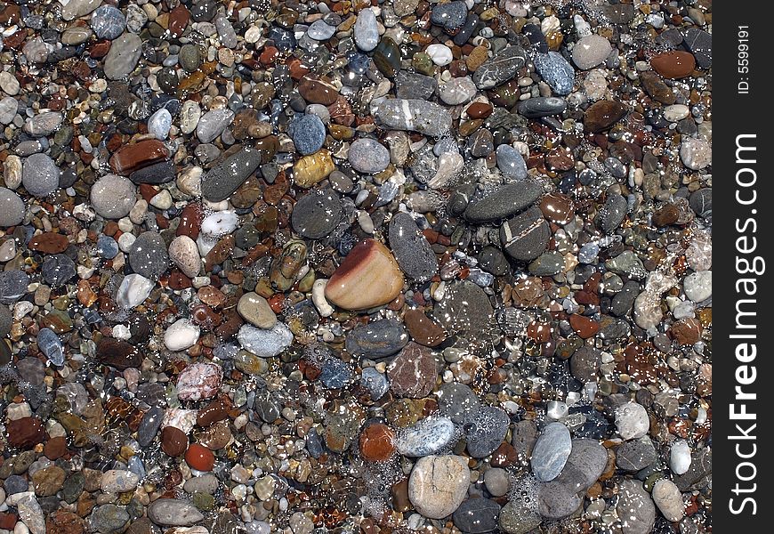 Abstract background with round wet pebble stones. Abstract background with round wet pebble stones