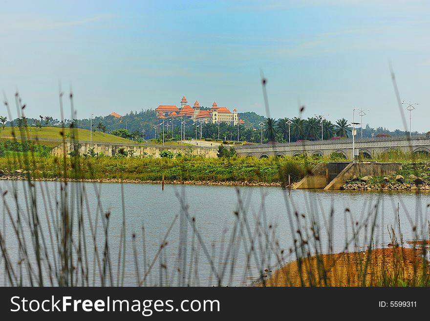 A landscape of Putrajaya wetland with background of Melawati Palace, Malaysia. A landscape of Putrajaya wetland with background of Melawati Palace, Malaysia