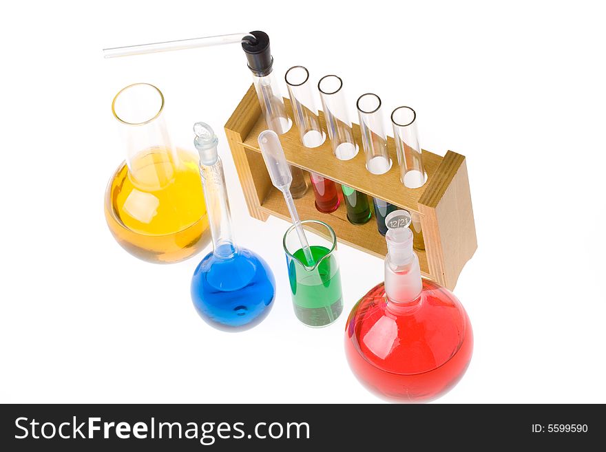Various colorful glass laboratory ware on a white background. Various colorful glass laboratory ware on a white background