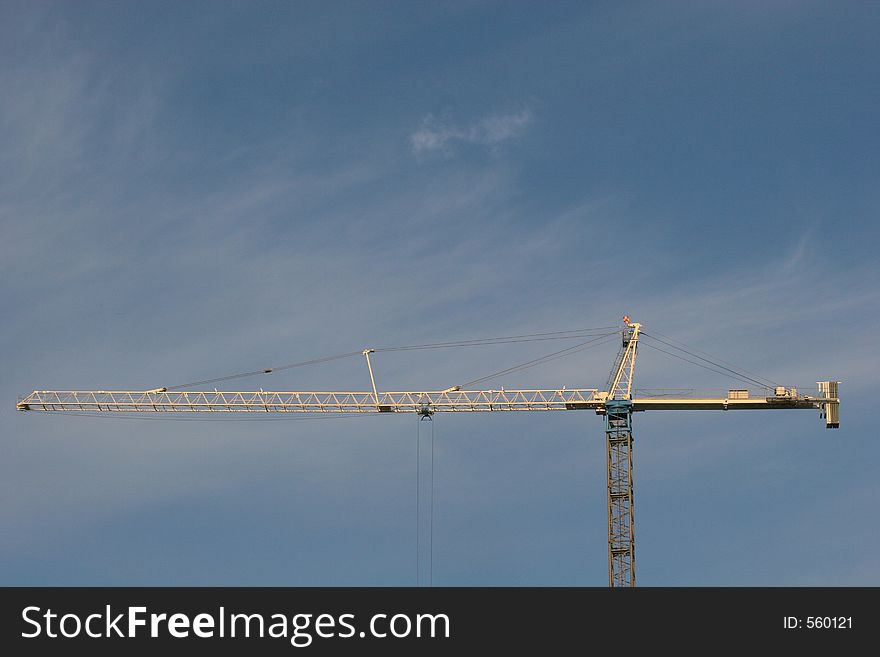 Construction Crane against blue sky