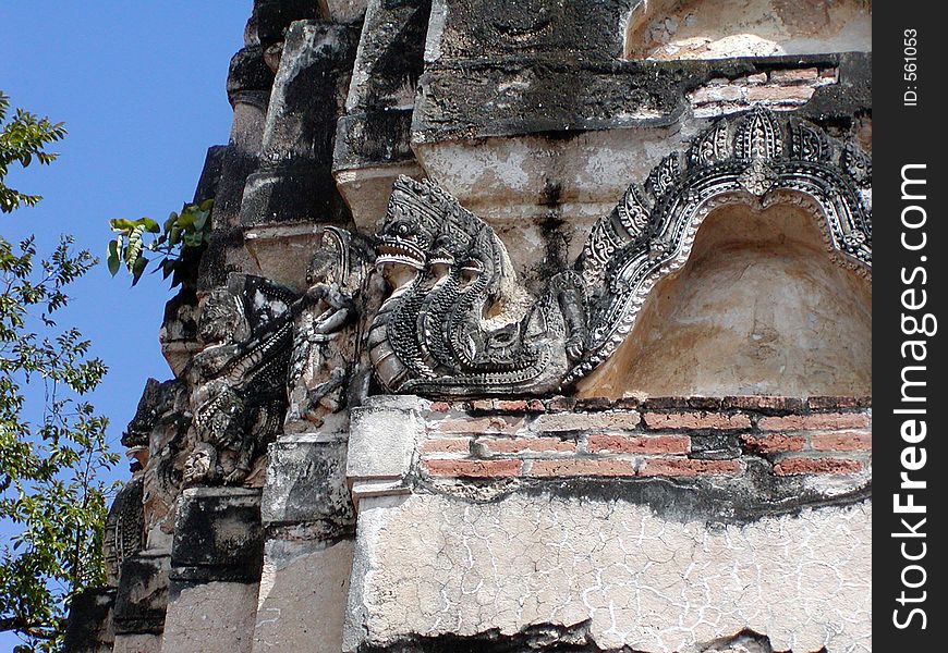 A Khmer temple detail depicting snakes