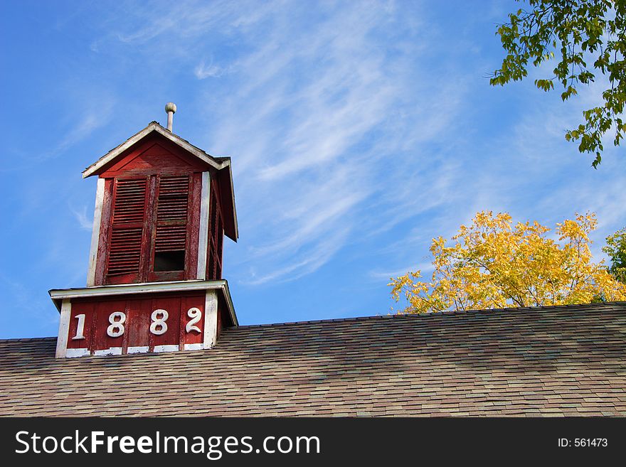 Cupola and roof of historic barn built in 1882 in Bishop Hill, Illinois. Cupola and roof of historic barn built in 1882 in Bishop Hill, Illinois.