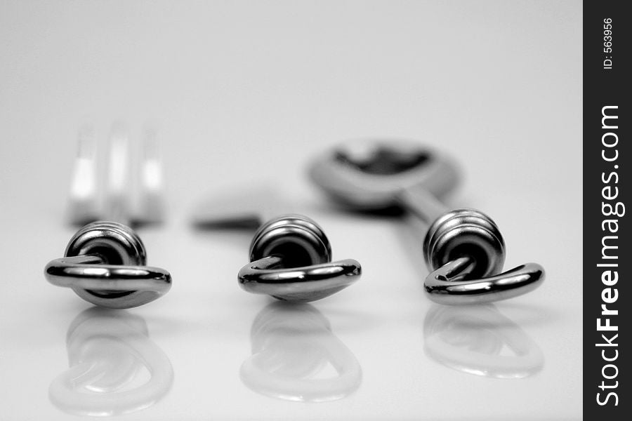Cutlery on a white background. shallow depth of field. Cutlery on a white background. shallow depth of field