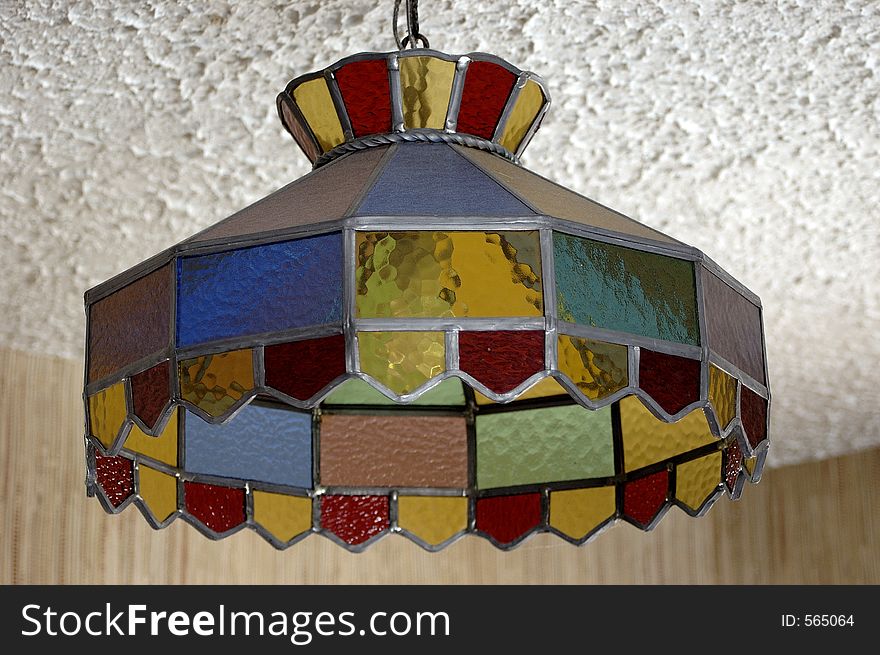 A beautiful multi-colored lamp shade. A beautiful multi-colored lamp shade