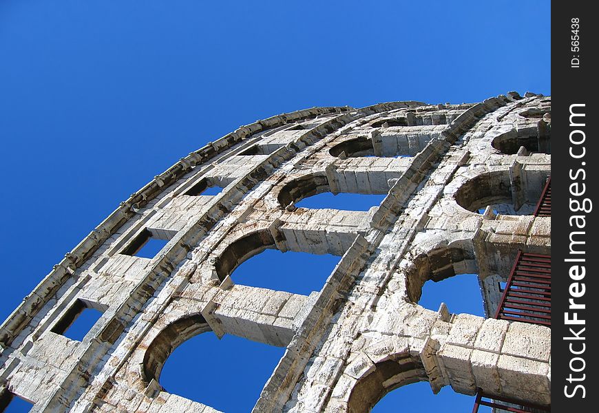 Arches of an ancient roman amphitheater in Pula, Croatia. Arches of an ancient roman amphitheater in Pula, Croatia