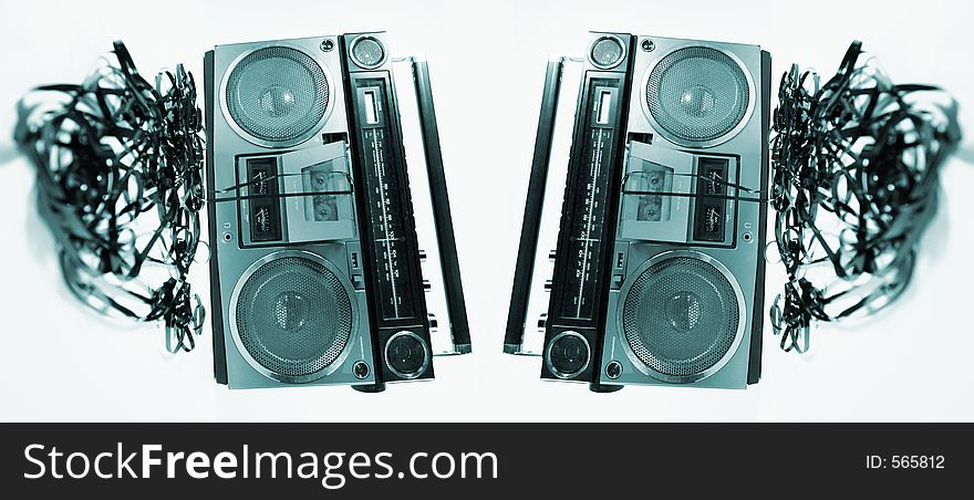 Cassette tape spewing out of a retro ghettoblaster. Cassette tape spewing out of a retro ghettoblaster