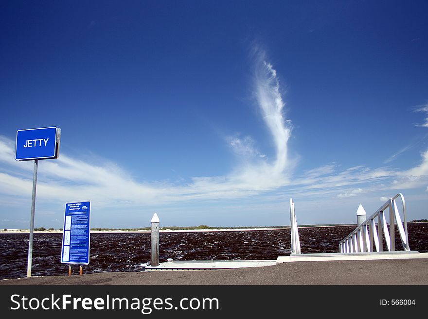 An unusual cloud formation where it is stretching up vertically. Taken by a jetty on the Sunshine Coast Australia. An unusual cloud formation where it is stretching up vertically. Taken by a jetty on the Sunshine Coast Australia